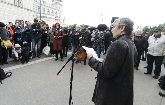 VIENNA, AUSTRIA - MAY 12: Chairwoman of the Austrian Platform for single parents Evelyn Martin adresses the audience at the event of SOS-Mitmensch - Renaming the Federal Chancellery into chancellery of poverty in front of the Federal Chancellery on M